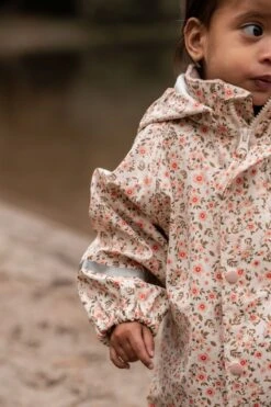 Celavi Regenoverall Blümchen Sandbeige/rosa Einteiler -Kinderbekleidungsgeschäft CELAVI SS22 35 1280x1280